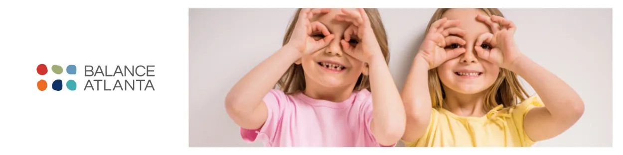 Balance Atlanta logo at left with two smiling children on the right making hand “binoculars” over their eyes