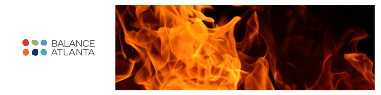 Balance Atlanta logo at left with a close-up of bright orange flames on a black background to the right.