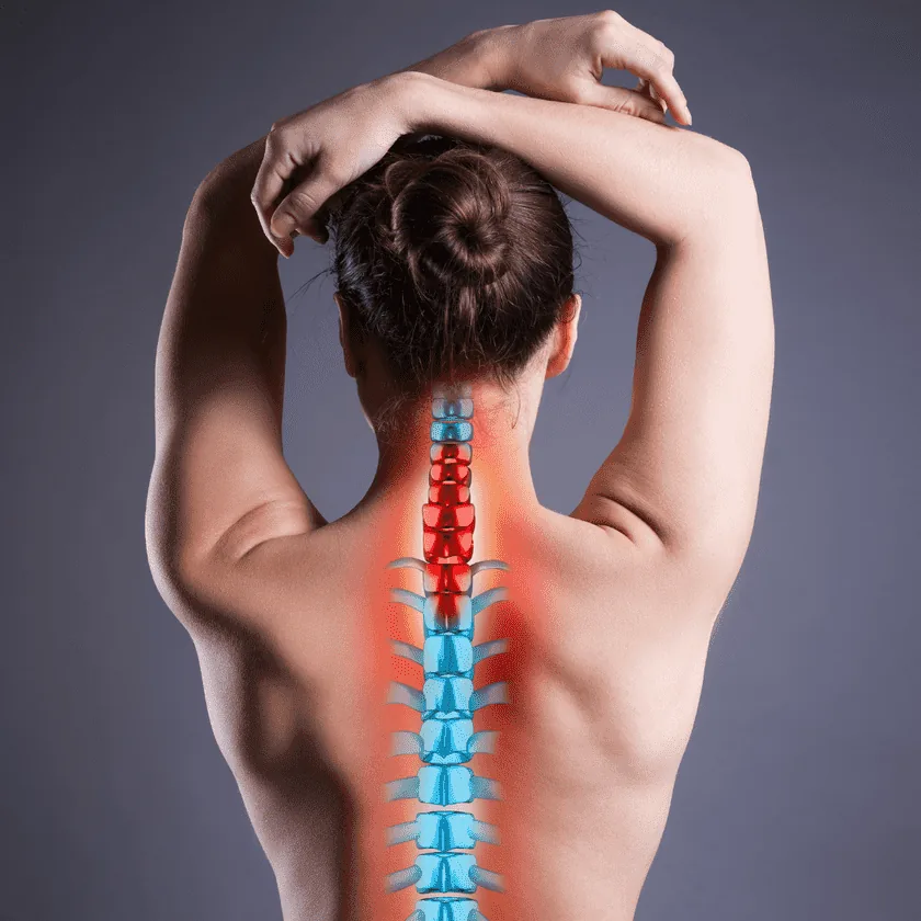 Person's upper back and neck with an overlaid spine graphic; blue vertebrae and red highlights mark areas of tension or pain.