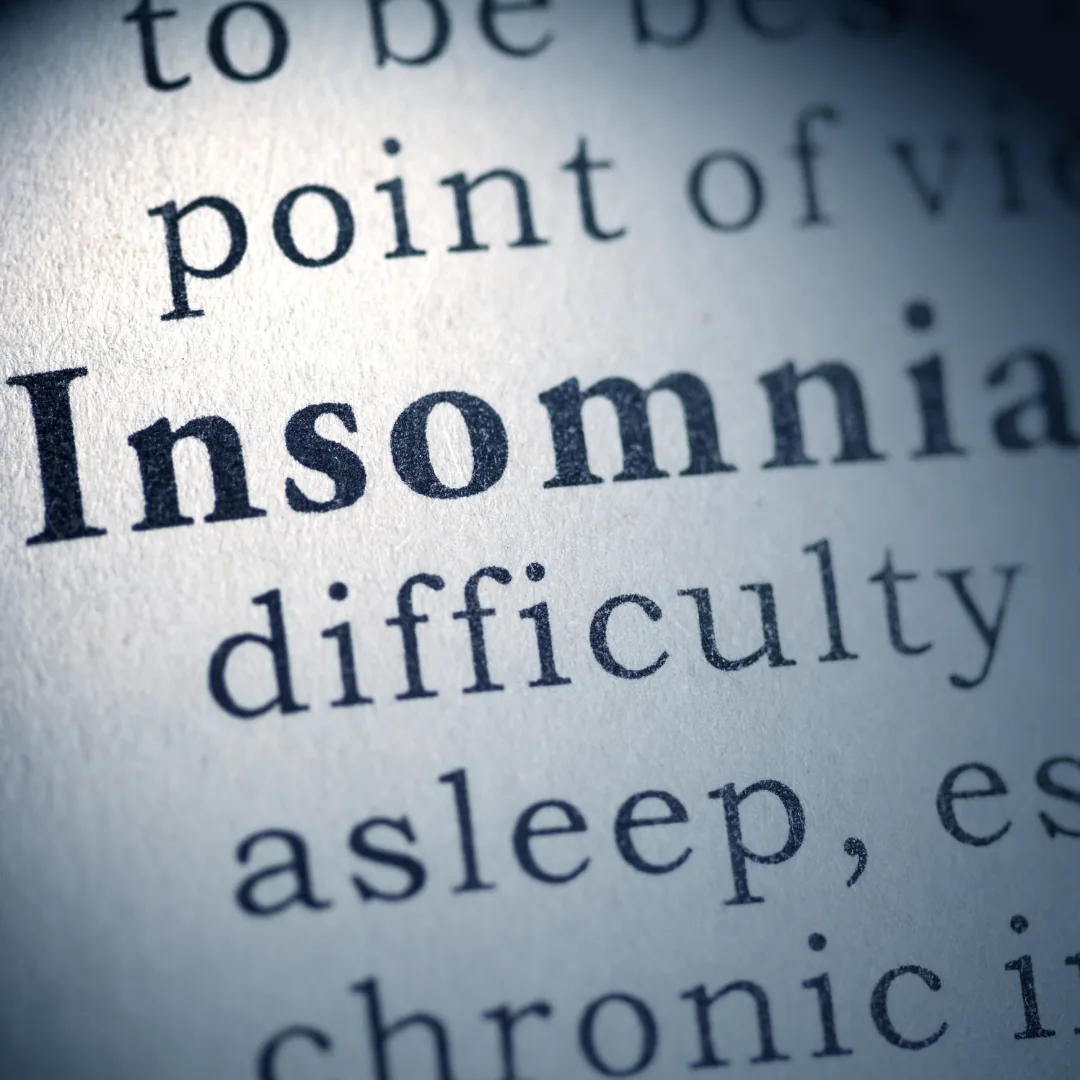 Close-up of the word 'Insomnia' and surrounding dictionary text.