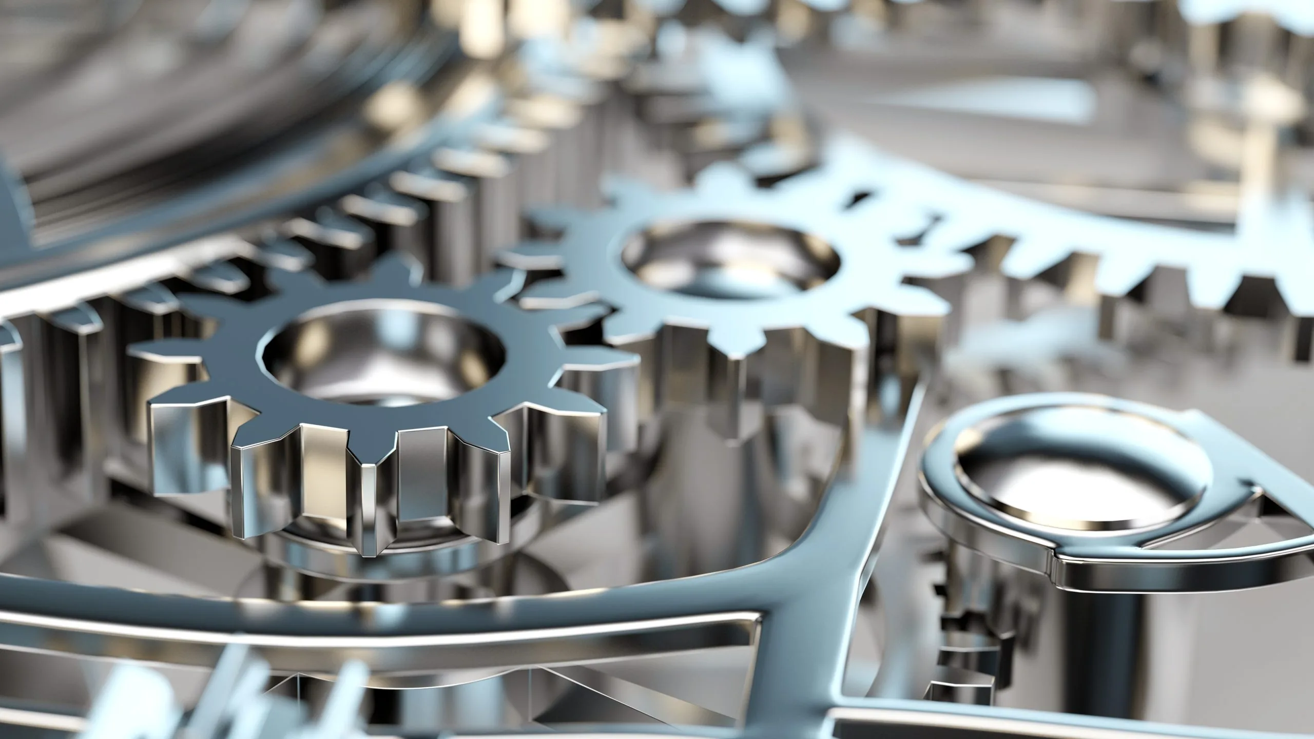 close-up of interlocking metallic gears inside a machine